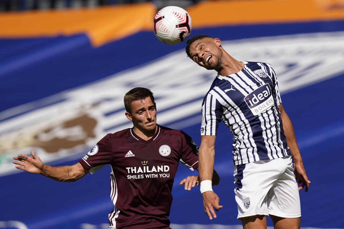 FILE - Leicester's Timothy Castagne, left, and West Bromwich Albion's Kieran Gibbs vie for the ball during the English Premier League soccer match between West Bromwich and Leicester City at the Hawthorns in West Bromwich, England, in this Sunday, Sept. 13, 2020, file photo. The newcomers joining Major League Soccer for the 2021 season lack some of the panache of previous years. In terms of recognizable names, Inter Miami may have landed the biggest by nabbing England left back Kieran Gibbs from West Bromwich Albion. (Tim Keeton/Pool via AP, File)
