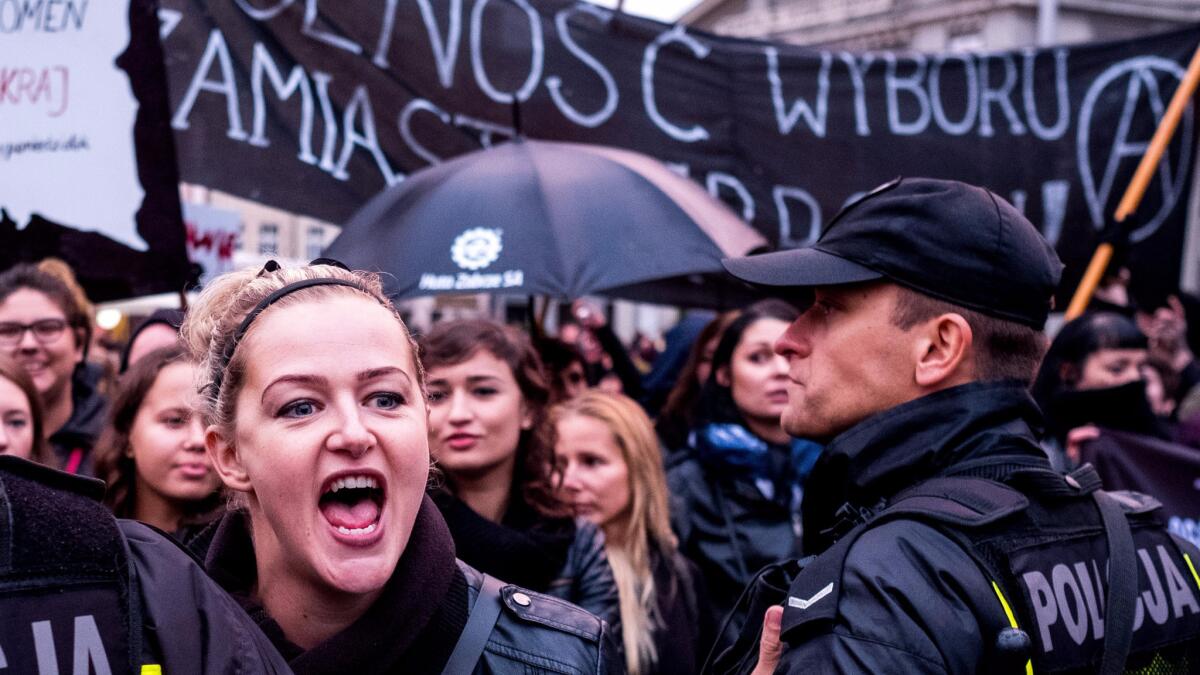 Thousands of workers take to the streets of Katowice, Poland, to protest a proposed abortion law. (Andrzej Grygiel/EPA)