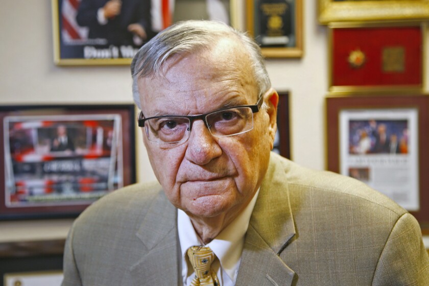 FILE - In this Aug. 26, 2019, file photo, former Maricopa County Sheriff Joe Arpaio poses for a portrait at his private office in Fountain Hills, Arizona. The taxpayer costs for the racial profiling lawsuit stemming from the immigration patrols launched a decade ago by Arpaio are expected to reach $202 million by the summer of 2022. Officials approved a tentative county budget Monday, May 17, 2021, that provides $31 million for compliance costs in the fiscal year that begins on July 1. No one in county government can say exactly when those costs will start to decline or end. (AP Photo/Ross D. Franklin, File)