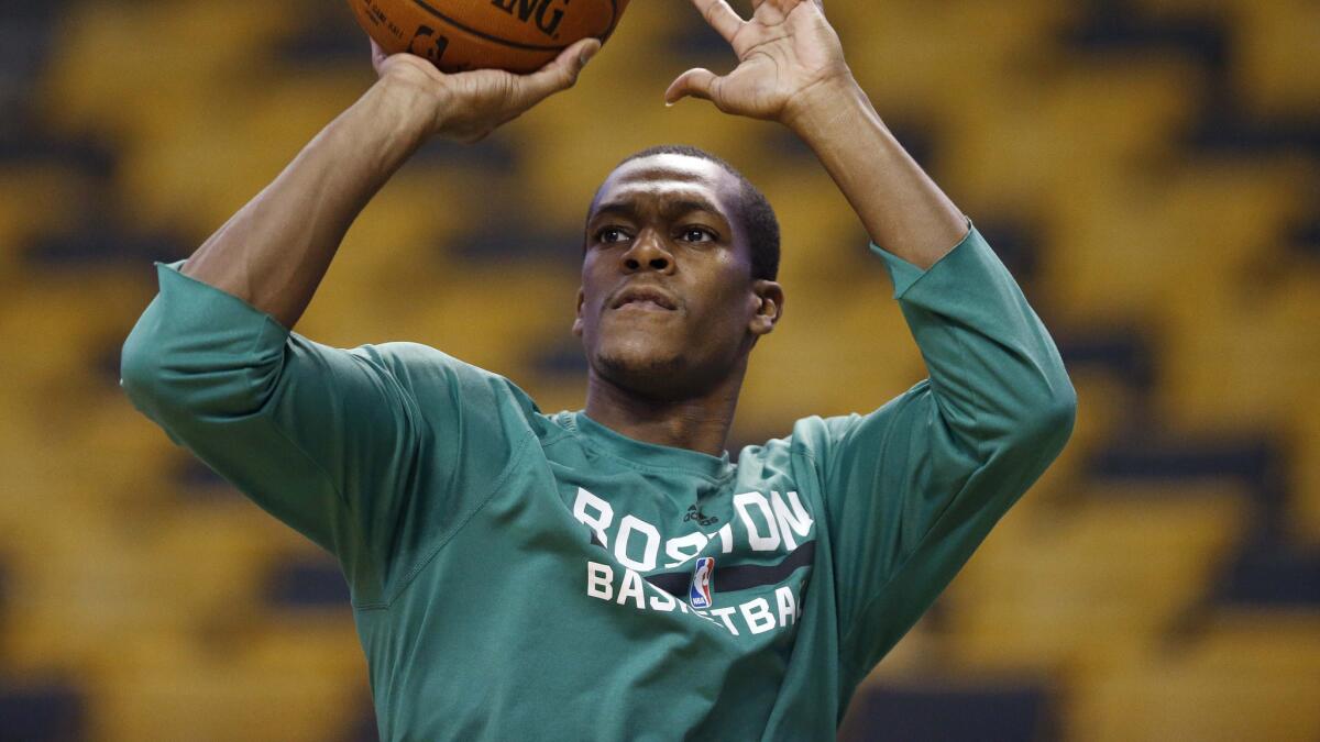 Boston Celtics point guard Rajon Rondo warms up before a game against the Portland Trail Blazers on Nov. 23.