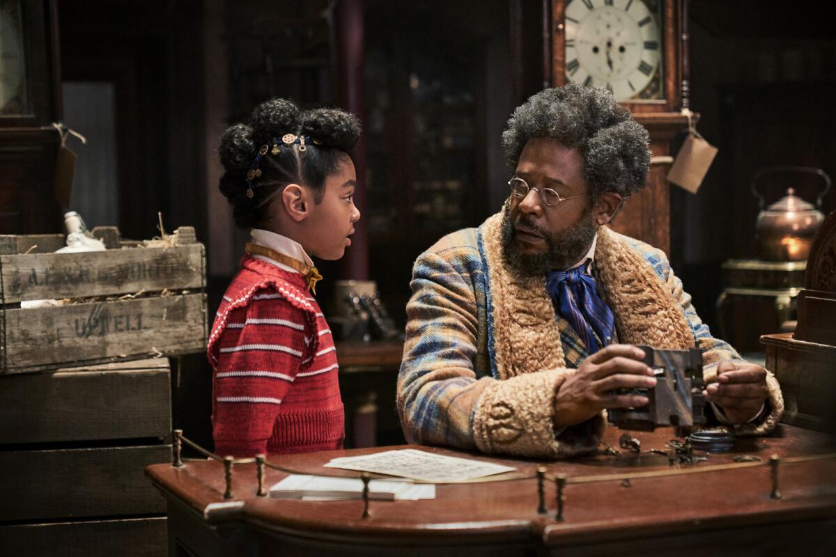 Madalen Mills and Forest Whitaker in the movie "Jingle Jangle: A Christmas Journey."