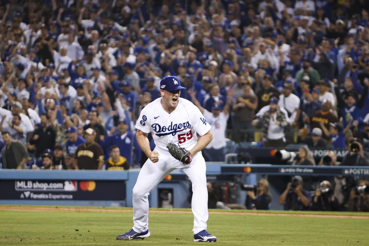 Evan Phillips celebrates during Game 1.