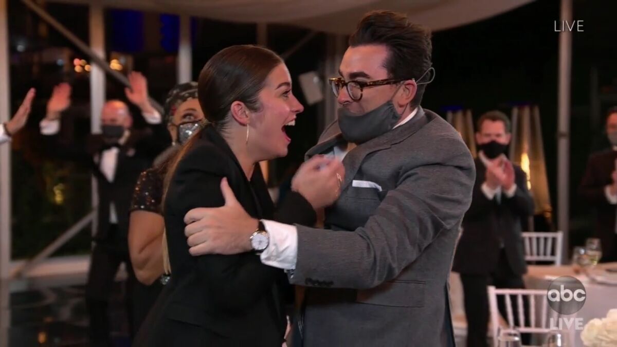 Annie Murphy and Dan Levy react after Murphy's win for outstanding supporting actress in a comedy series in "Schitt's Creek."