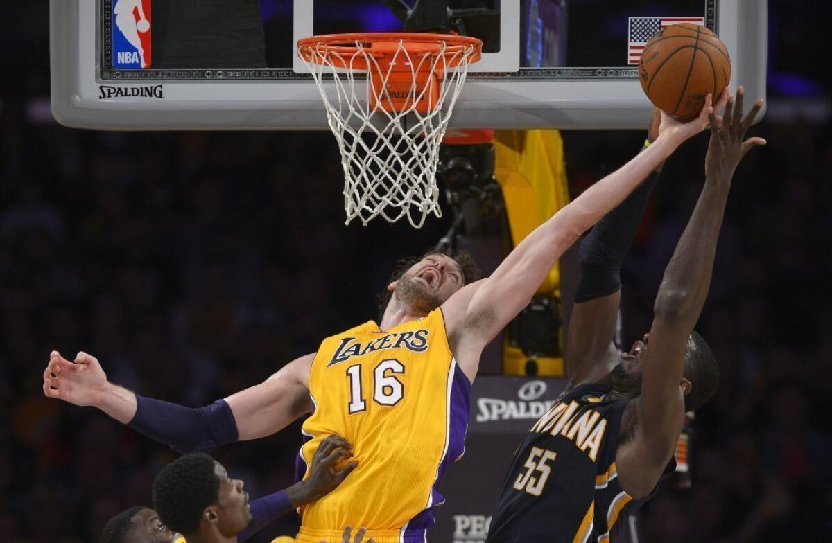 Lakers center Pau Gasol goes for a rebound on Jan. 28.