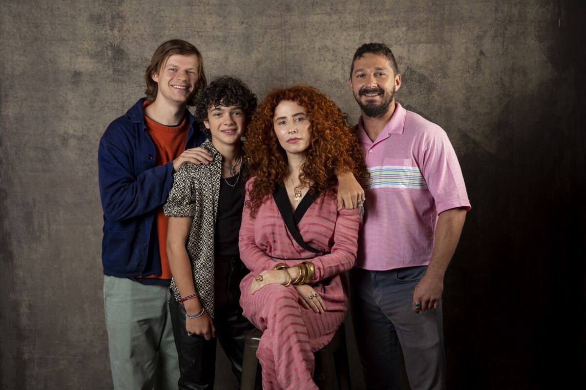 Actors Lucas Hedges, left, and Noah Jupe, director Alma Har'el and actor Shia LaBeouf, from the film "Honey Boy," photographed in the L.A. Times Photo Studio at the Toronto International Film Festival.