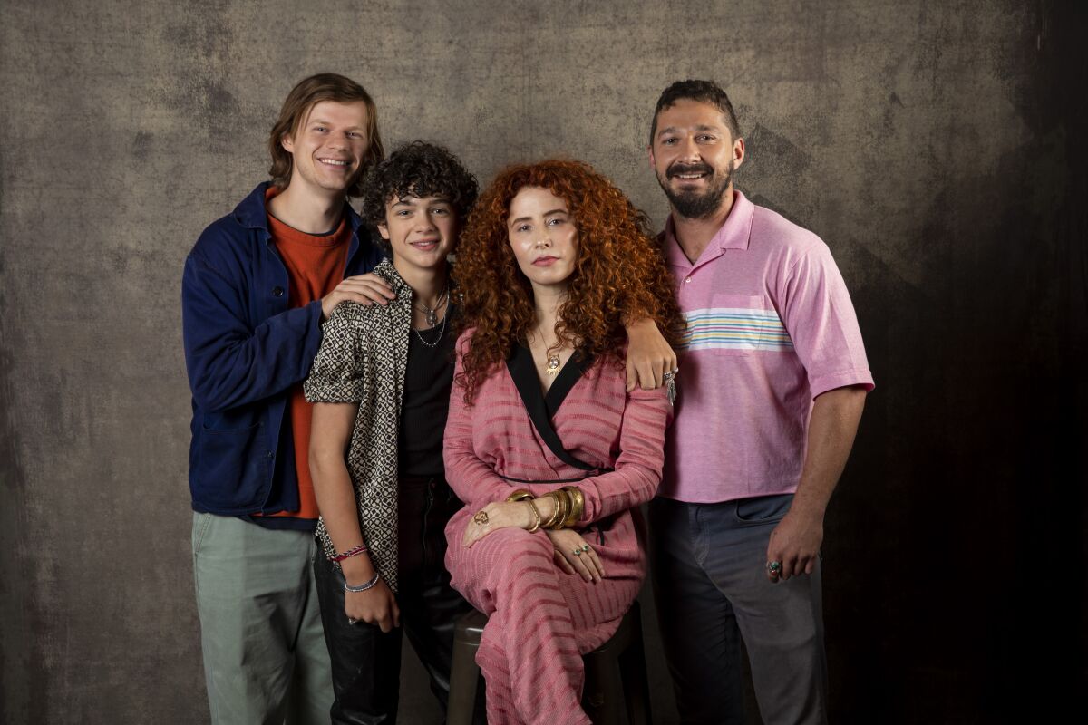 Actors Lucas Hedges, left, and Noah Jupe, director Alma Har'el and actor Shia LaBeouf, from the film "Honey Boy," photographed in the L.A. Times Photo Studio at the Toronto International Film Festival.