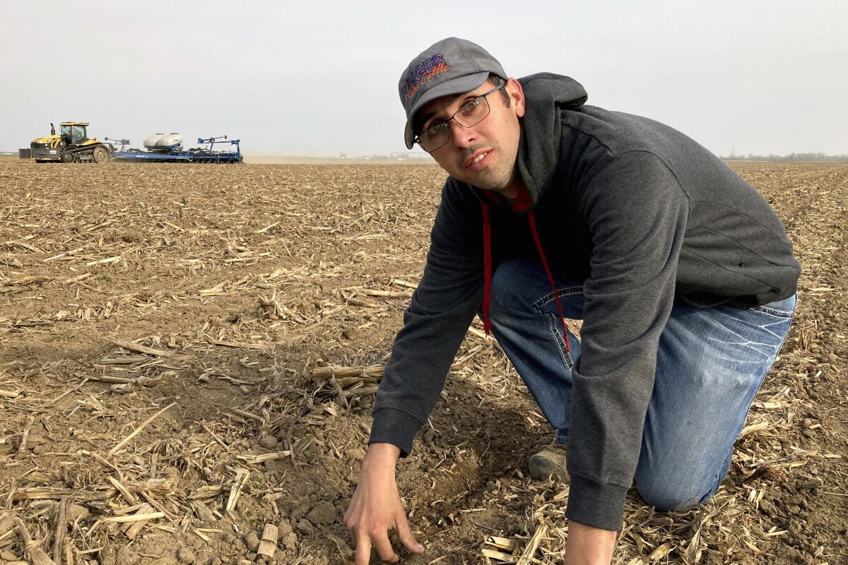 Farmer Lance Unger in his field near Carlisle, Ind.