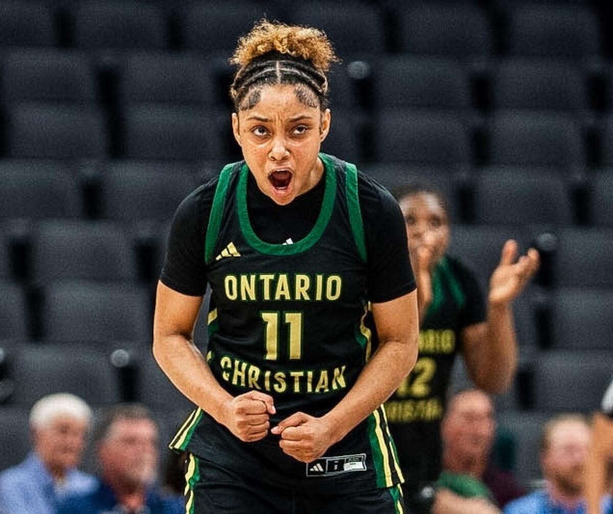 Kaleena Smith of Ontario Christian gets affectional successful nan first half astatine Golden 1 Center against Archbishop Mitty.