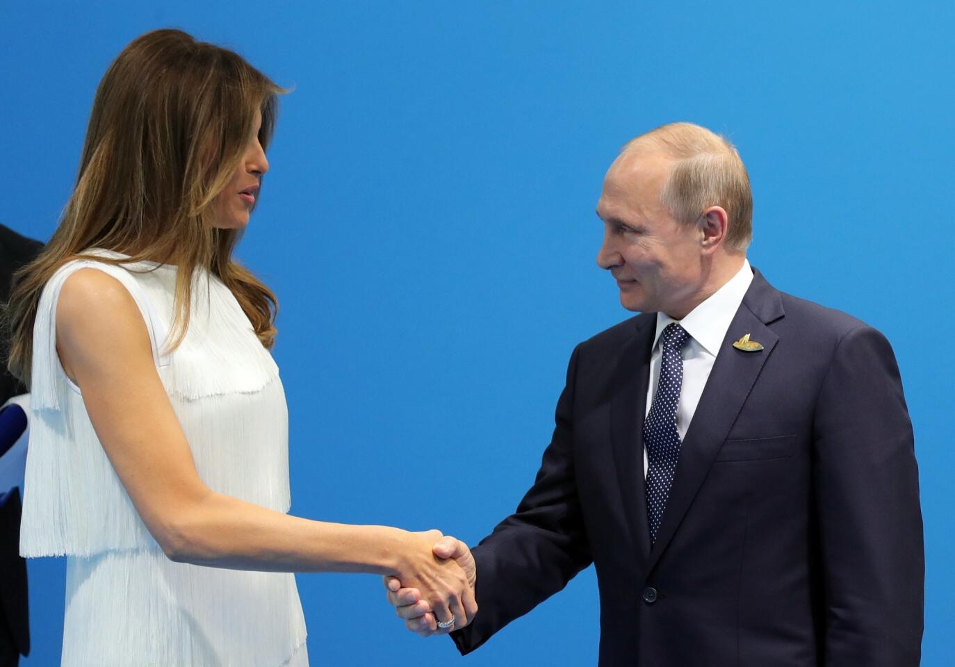 Melania Trump and Vladimir Putin
