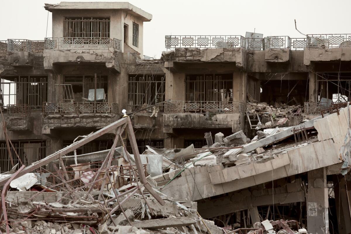 Buildings in Haji Ziad Square in the Iraqi city of Ramadi show extensive damage in this March 20, 2016, photo, months after U.S.-backed Iraqi forces freed the city from the grip of Islamic State militants.