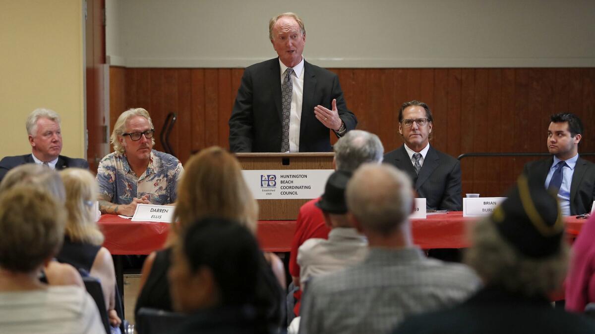 Incumbent Mike Posey, the current mayor, speaks during a Huntington Beach City Council candidates forum Monday at the Murdy Park recreation center.