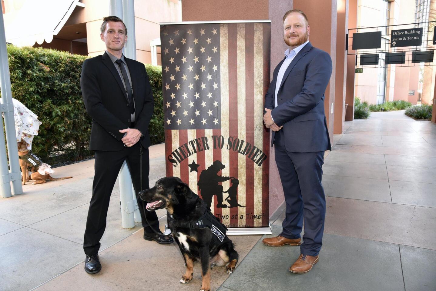 Head Dog Trainer Stephen Snyder with Bash, Founder/Training Director Graham Bloem