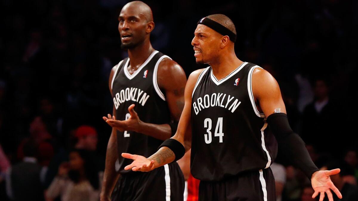 Paul Pierce (34) and Kevin Garnett combined to play three seasons for the Nets.