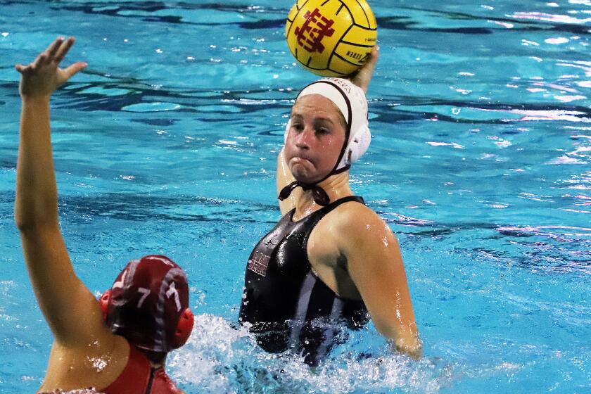 Laguna Beach's Kara Carver shoots for a goal in the CIF Southern Section Open Division quarterfinal match.