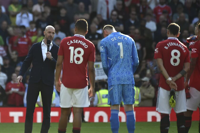 Manchester United's head coach Erik ten Hag adresses to his players at the end of the English Premier League soccer match between Manchester United and Fulham at Old Trafford in Manchester, England, Sunday, May 28, 2023. (AP Photo/Rui Vieira)