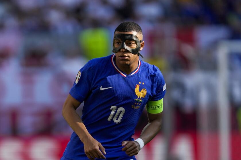 Kylian Mbappe of France during a Group D match between the France and Poland at the Euro 2024 soccer tournament in Dortmund, Germany, Tuesday, June 25, 2024. (AP Photo/Darko Vojinovic)