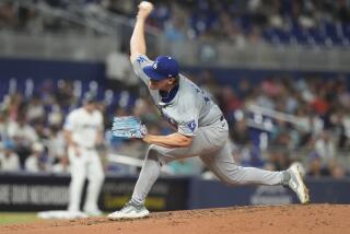 Los Angeles Dodgers pitcher Landon Knack (96) aims a pitch during the second inning of a baseball game against the Miami Marlins, Wednesday, Sept. 18, 2024, in Miami. (AP Photo/Marta Lavandier)