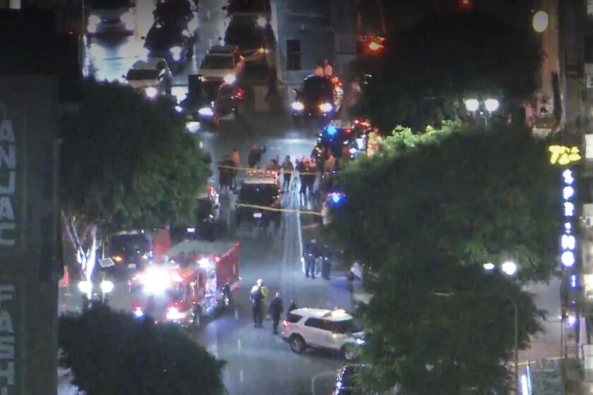 Four people were shot in downtown Los Angeles Thursday night, and police are looking for four to five suspects, according to the Los Angeles Police Department. The shooting was reported at 9:35, when two men and a woman were struck by gunfire at 7th and Spring streets, according to Officer Hernandez of the LAPD. Their condition is unknown.