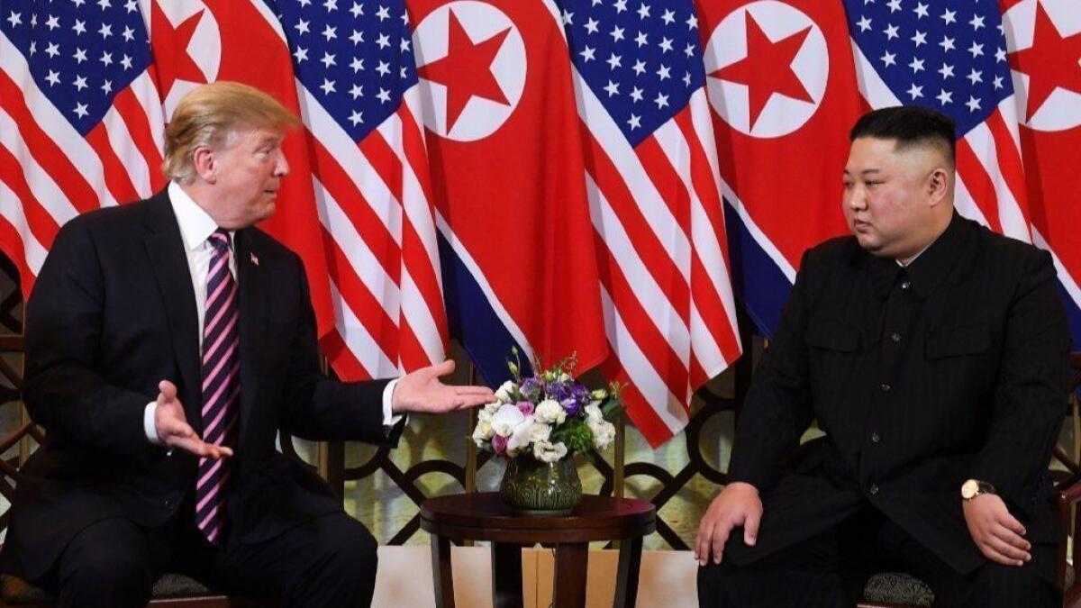 President Trump speaks with North Korea's leader Kim Jong Un during a meeting in Hanoi last month.