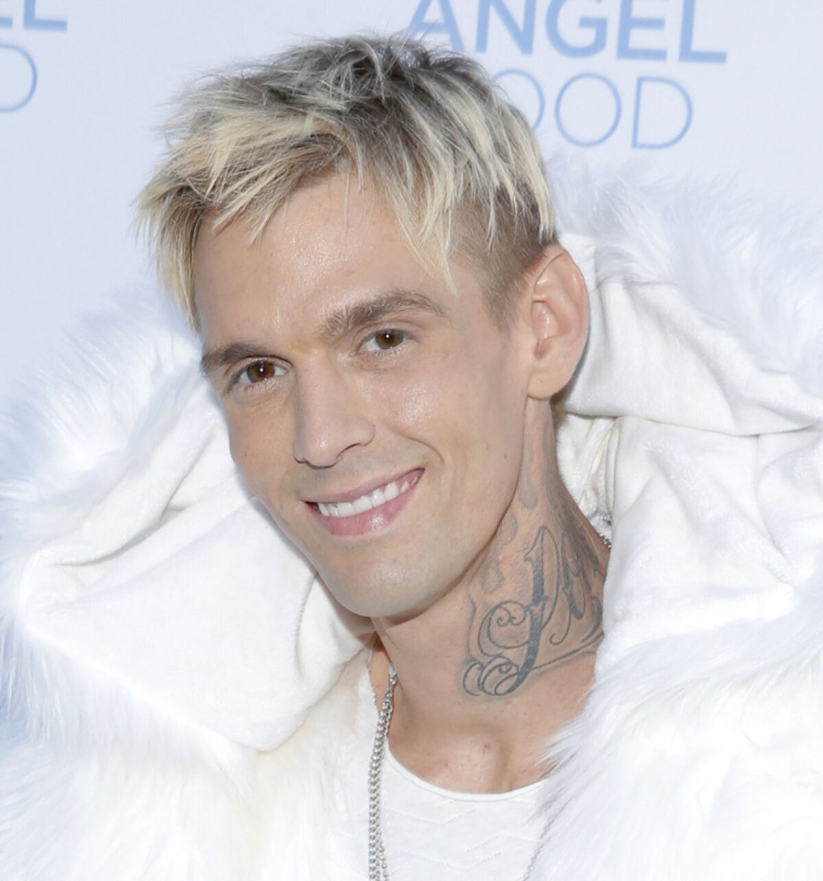 Aaron Carter's face before the new tattoo.