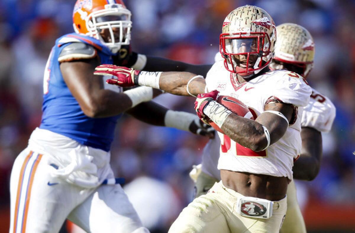 Running back James Wilder Jr. and Florida State have moved to No. 1 in the two big college football polls this week.