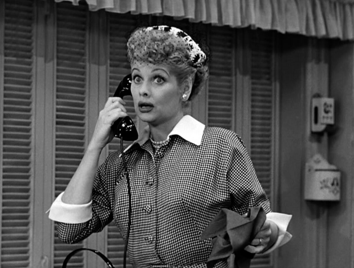 Lucille Ball, as Lucy Ricardo, talks on the telephone in a scene from an episode of the television comedy "I Love Lucy."