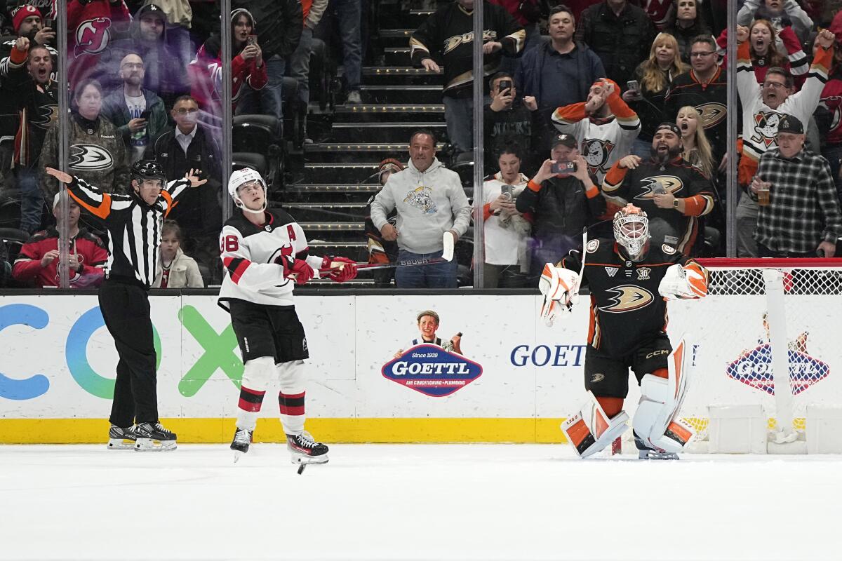 Ducks goaltender Lukas Dostal celebrates after stopping a penalty shot by New Jersey Devils forward Jack Hughes.