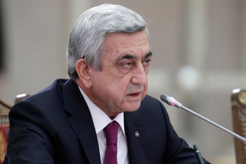 FILE - In this Monday, Dec. 26, 2016 file photo, Armenian President Serzh Sargsyan attends the Supreme Eurasian Economic (SEEC) Council meeting in St.Petersburg, Russia. Dozens of opposition demonstrators have briefly seized the headquarters of Armeniaâs public radio to protest the former presidentâs shift into the prime ministerâs seat. Protesters led by opposition lawmaker Nikol Pashinian broke into the building Saturday, April 14, 2018 and tried to get on the air but failed and retreated shortly after. The incident comes amid protests against a recent change of government that the opposition sees as a move for ex-President Serzh Sargsyan to stay in power. (AP Photo/Dmitri Lovetsky)