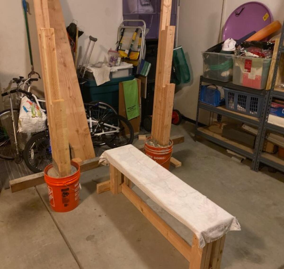 Sulayman Adeoye of Sherman Oaks Notre Dame built wooden racks.