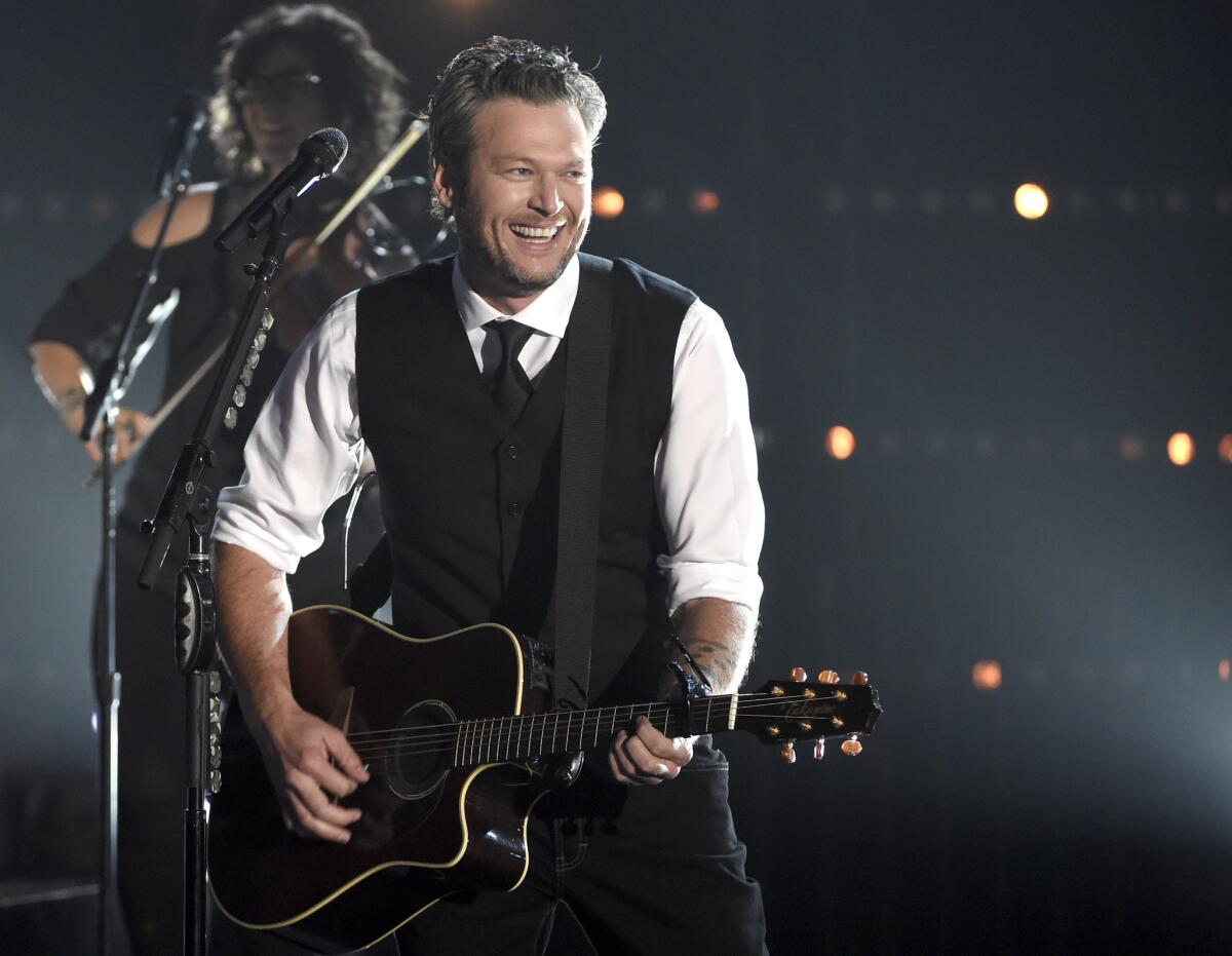 Blake Shelton performs at the 49th CMA Awards at the Bridgestone Arena in Nashville on Wednesday.
