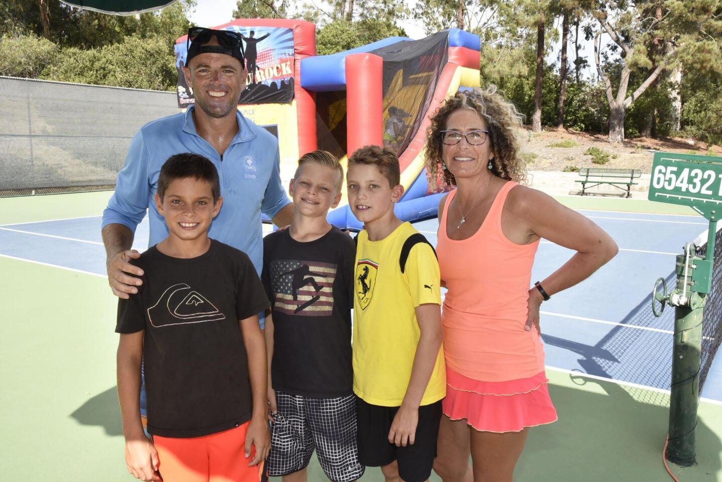 Head tennis pro Derek Miller with his sons Blake and Logan, friend/tennis student Sasha, event coordinator Birgitte Bradshaw