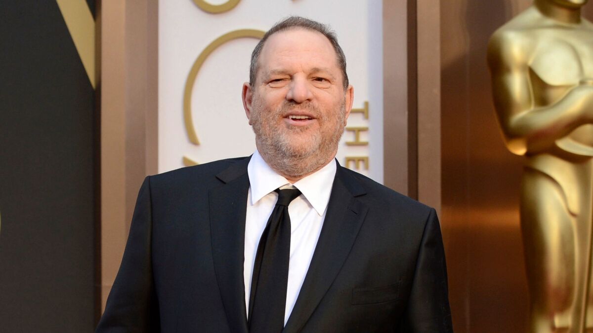 Harvey Weinstein arrives at the Oscars in 2014.