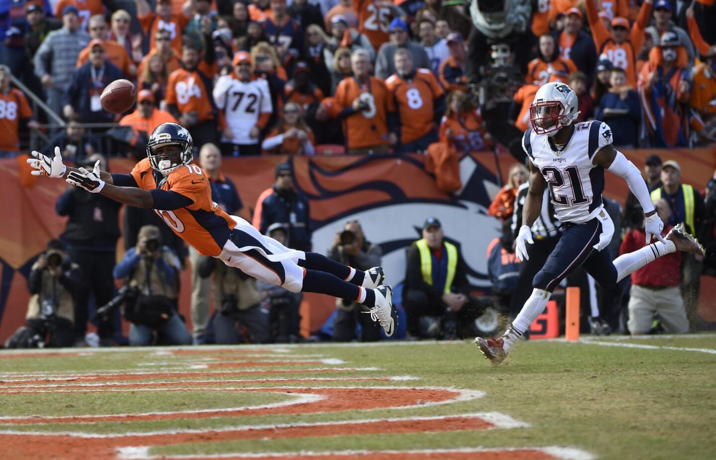 Denver receiver Emmanuel Sanders dives for the ball in front of New England cornerback Malcolm Butler during the first half of the AFC Championship game on Jan. 24.
