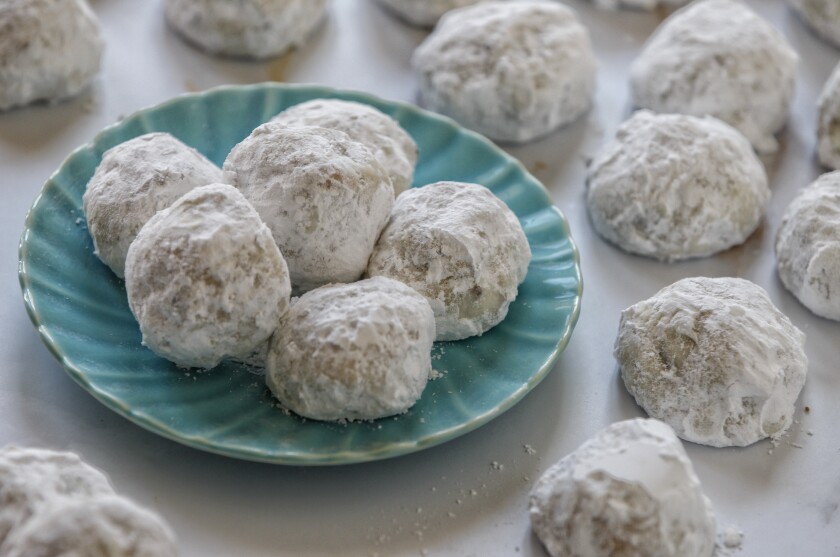 Lemon-Cranberry Snowballs, a variety typically called Mexican Wedding Cookies or Russian Teacakes.