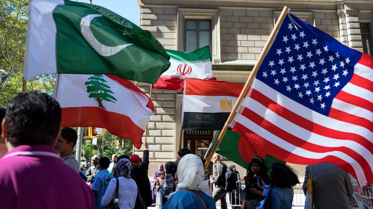 Marchers carry Pakistani, Lebanese, Iranian, Egyptian and American flags in the Muslim Day Parade on Madison Avenue in New York on Sept. 25 2016.