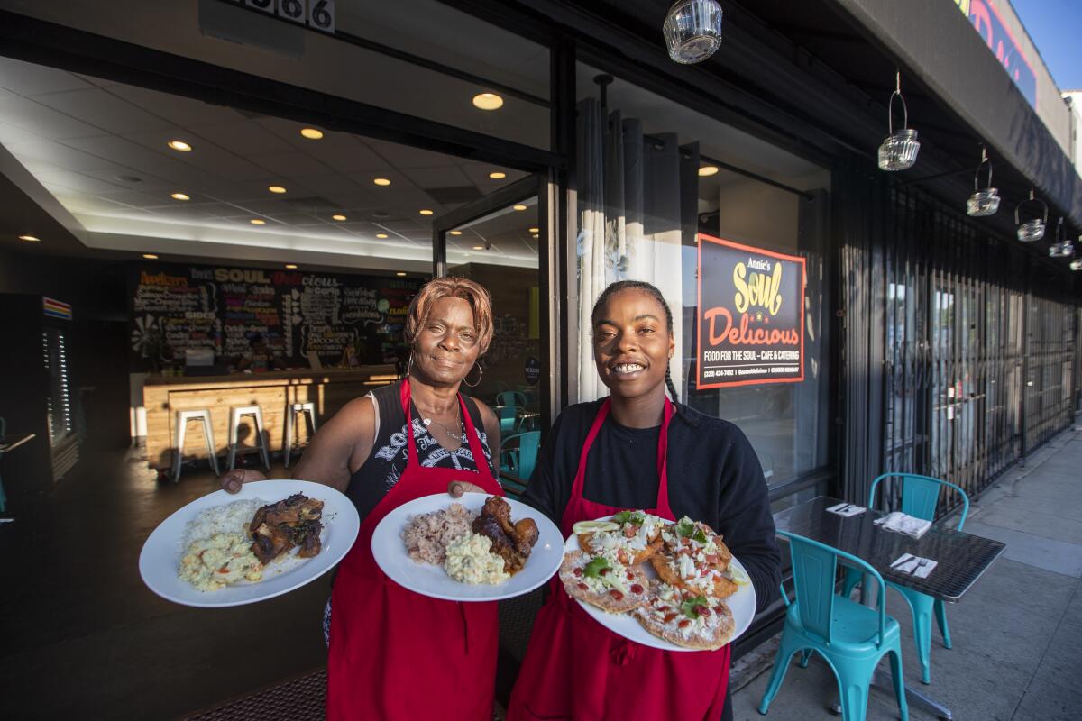 Tina McKenzie, right, and her mother, Dorla De Costa, aim to put Belizean food and culture on the map at their restaurant No Reservation L.A. in Little Ethiopia.