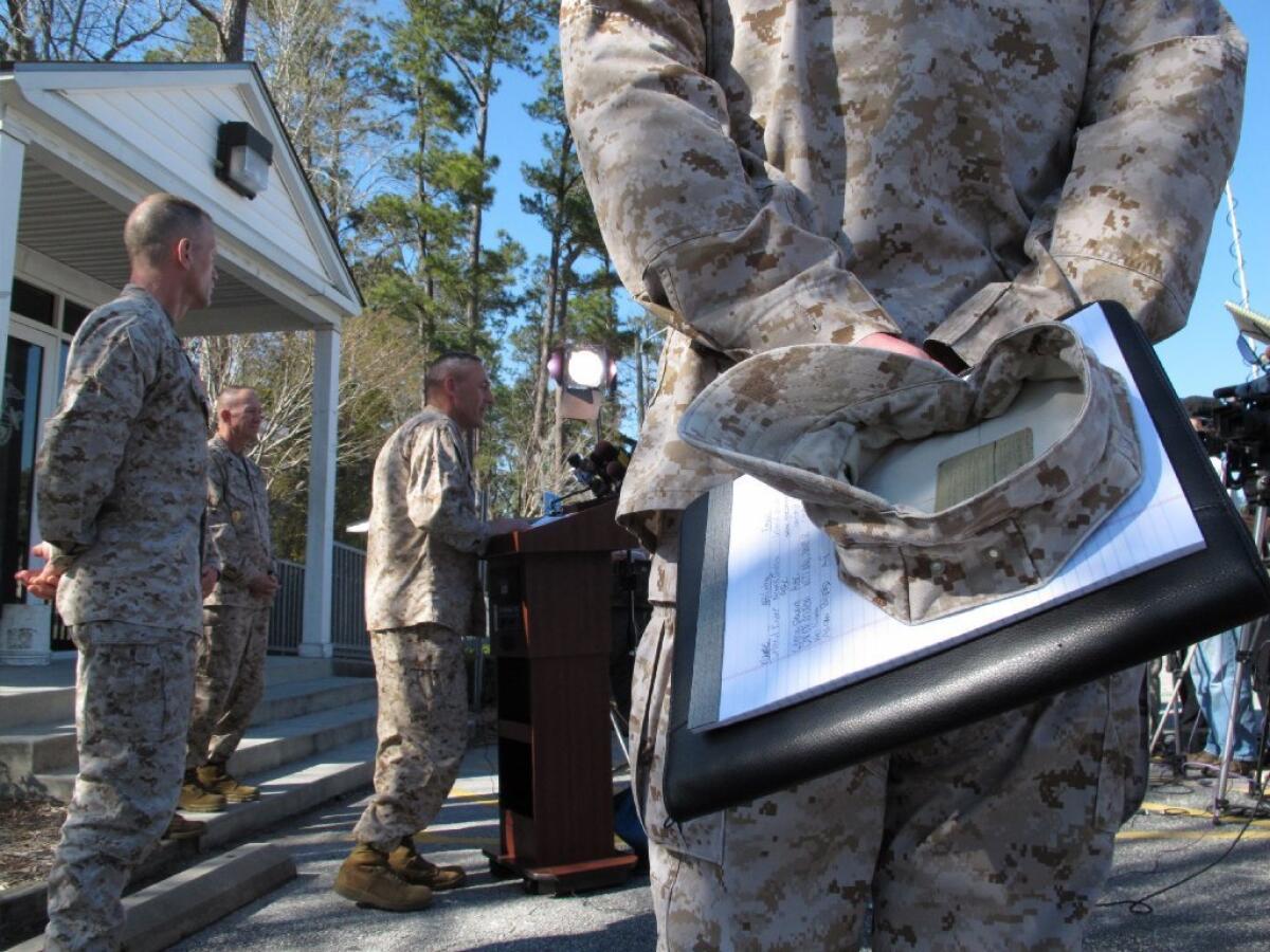 Marine Brig. Gen. Jim Lukeman addresses the media outside the gates of Camp Lejeune, N.C., on March 19. Seven Marines from the base were killed in a mortar accident in Nevada.