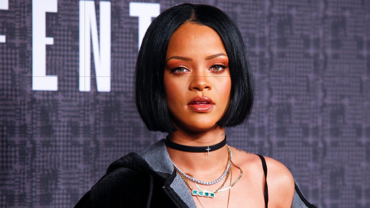 A February 12, 2016, file photo of Rihanna at the JFenty Puma by Rihanna fashion show held during New York Fashion Week.