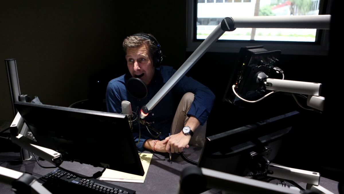 Kai Ryssdal, host and senior editor of the program "Marketplace," prepares to record an episode of his "Make Me Smart" podcast.