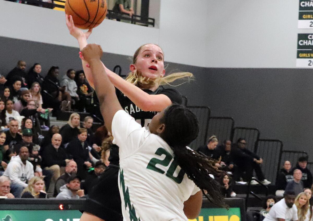 Sage Hill's Annabelle Spotts (15) shoots over an Ontario Christian defender on Wednesday.