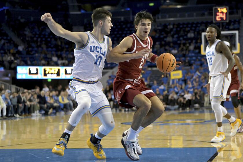 UCLA guard Lazar Stefanovic guards Stanford's Andrej Stojakovic during a game Wednesday