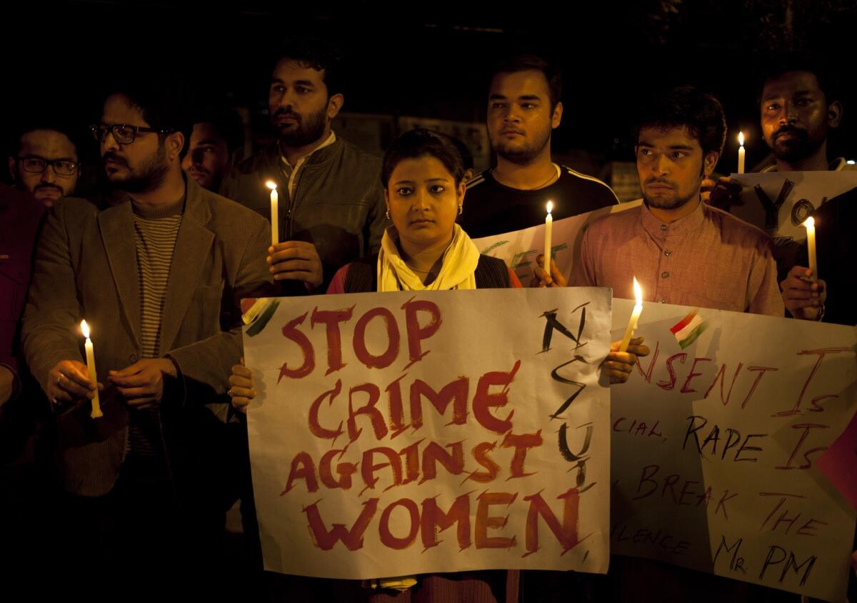 Indian youth hold candles during a demonstration against sexual violence in New Delhi in February. A BBC documentary in which a man convicted in a horrific gang rape blames the victim is stirring debate in India.