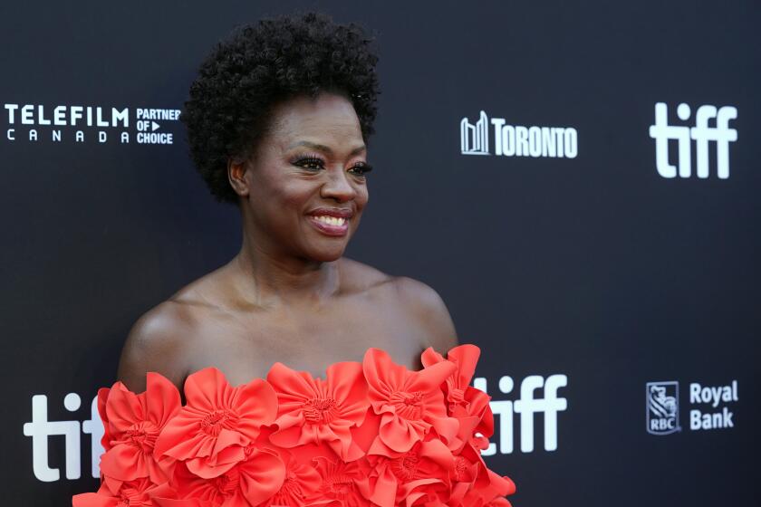 Viola Davis poses at the premiere of the film "The Woman King" at Roy Thomson Hall during the 2022 Toronto International Film Festival, Friday, Sept. 9, 2022, in Toronto. (AP Photo/Chris Pizzello)