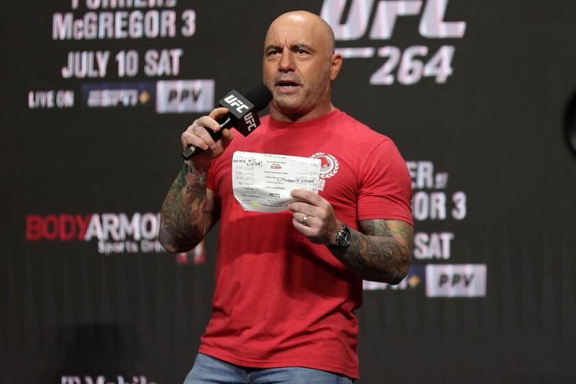 LAS VEGAS, NEVADA - JULY 09: UFC commentator Joe Rogan announces the fighters during a ceremonial weigh in for UFC 264 at T-Mobile Arena on July 09, 2021 in Las Vegas, Nevada. (Photo by Stacy Revere/Getty Images)