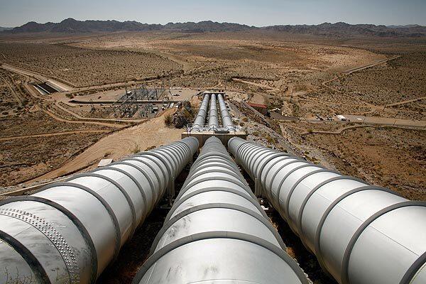 Pipes 10 feet in diameter are set up to carry Colorado River water uphill at the Southern California Metropolitan Water District's Julian Hinds Pumping Plant so gravity can power the final leg of its journey. The plant is idle for maintenance.