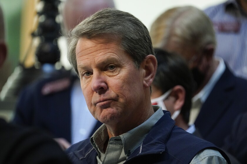 Georgia Gov. Brian Kemp listens to a question during a news conference at the State Capitol on Saturday, April 3, 2021, in Atlanta, about Major League Baseball's decision to pull the 2021 All-Star Game from Atlanta over the league's objection to a new Georgia voting law. (AP Photo/Brynn Anderson)
