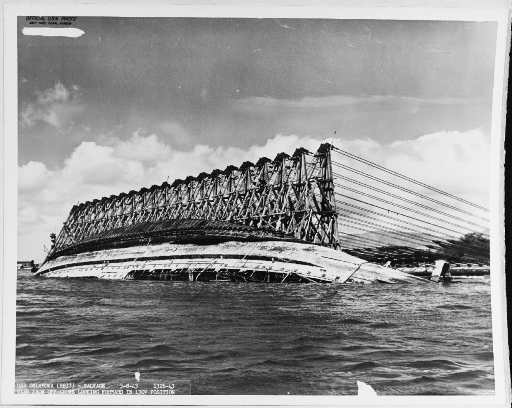 The capsized battleship Oklahoma.