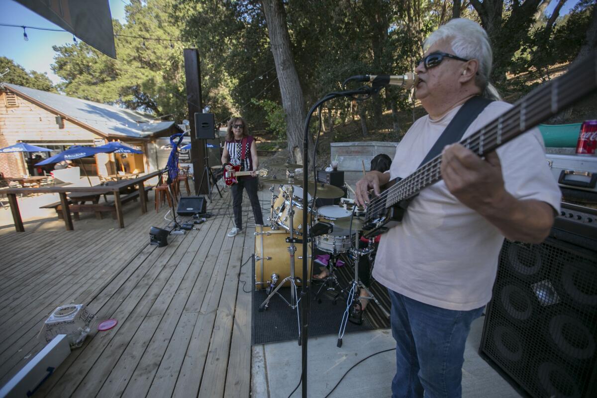 Eddie Dominguez, right, with the band "Switchblade" performed at the newly remodeled Josie's Hideout Saloon on Thursday, September 14, 2019, near Lake Henshaw in San Diego County.