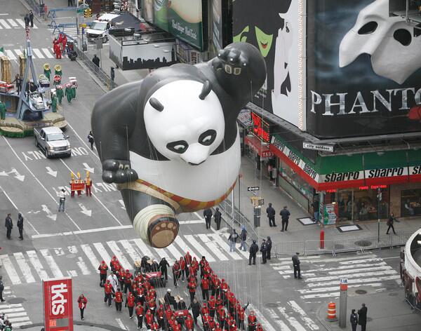 The Kung Fu Panda Balloon floats through Times Square.