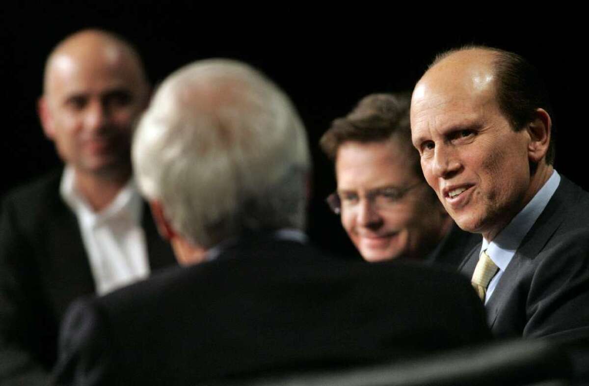 Big wheels in philanthropy, but are they conservatives or liberals? From left, Andre Agassi, Ted Turner, Michael J. Fox and Michael Milken at a 2007 Milken Institute discussion of public figure philanthropy.